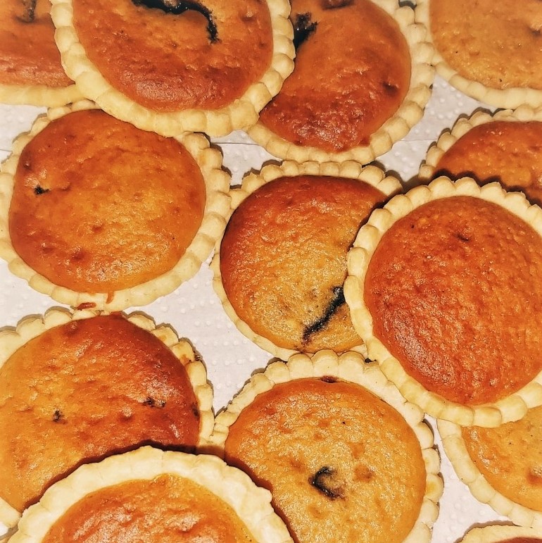 Tarts filled with sponge and jam.